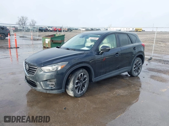 2016 Mazda CX-5 Grand Touring with VIN JM3KE4DY3G0769448, listed as a IAAI auction lot 41947725 with 154,051 mi miles and . Bid and sale history available at carsss.com. Image 21.