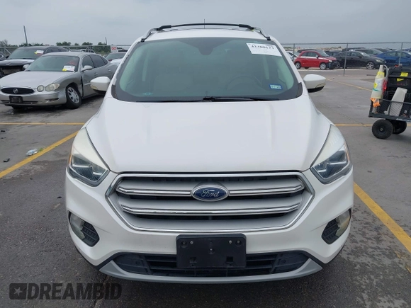2018 Ford Escape Titanium with VIN 1FMCU9J98JUB87867, listed as a IAAI auction lot 42300123 with 48,357 mi miles and . Bid and sale history available at DreamBid. Image 12.