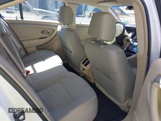 2015 Ford Taurus SE with VIN 1FAHP2D80FG176157, listed as a IAAI auction lot 41985771 with 102,252 mi miles and . Bid and sale history available at carsss.com. Image 8.