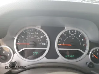 2007 Jeep Wrangler Sahara z VIN 1J8FA54137L209032, wystawiony jako Copart lot #56502475 z przebiegiem 129 402 mil mil oraz Szkoda całkowita • Salvage title. Historia ofert i sprzedaży dostępna na DreamBid. Obrazek 9.