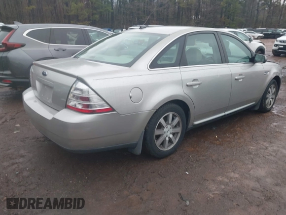 2008 Ford Taurus SEL with VIN 1FAHP24W78G105183, listed as a IAAI auction lot 41441086 with 215,758 mi miles. Bid and sale history available at carsss.com. Image 4.