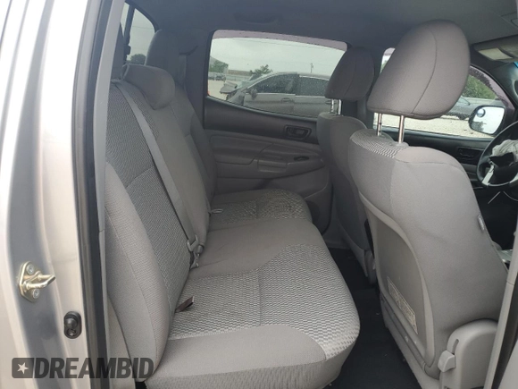 2014 Toyota Tacoma with VIN 3TMMU4FN0EM072840, listed as a Copart auction lot 51740805 with 128,678 mi miles and Salvage title. Bid and sale history available at DreamBid. Image 10.