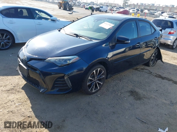 2019 Toyota Corolla L with VIN 5YFBURHE7KP922064, listed as a IAAI auction lot 41977741 with 54,896 mi miles and . Bid and sale history available at DreamBid. Image 17.