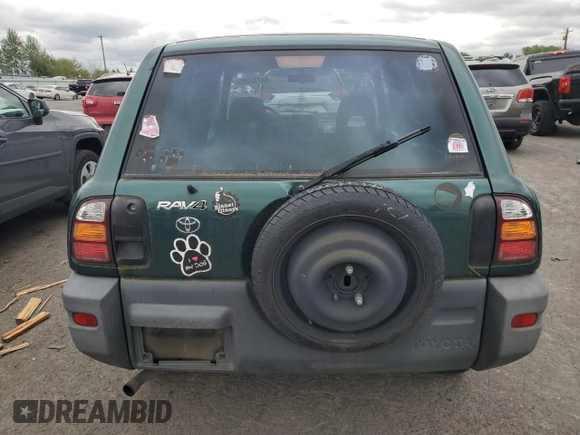 1999 Toyota RAV4 with VIN JT3GP10V2X0037464, listed as a Copart auction lot 54732085 with 306,550 mi miles and Clean Title. Bid and sale history available at DreamBid. Image 6.