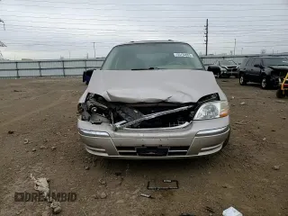 2003 Ford Windstar SE with VIN 2FMDA52413BB59104, listed as a Copart auction lot 55134805 with 132,918 mi miles and Salvage title. Bid and sale history available at DreamBid. Image 14.