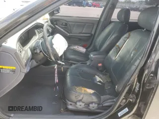 2003 Hyundai Elantra GLS with VIN KMHDN45D03U500898, listed as a Copart auction lot 61473825 with 127,252 mi miles and Salvage title. Bid and sale history available at DreamBid. Image 7.