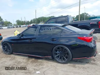 2015 Infiniti Q50 Premium z VIN JN1BV7AR8FM398319, wystawiony jako IAAI lot #42170789 z przebiegiem 86 108 mil mil oraz . Historia ofert i sprzedaży dostępna na DreamBid. Obrazek 14.