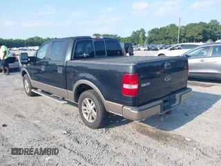 2005 Ford F-150 XLT with VIN 1FTPW12575KD47090, listed as a IAAI auction lot 42469356 with 168,159 mi miles and . Bid and sale history available at DreamBid. Image 3.
