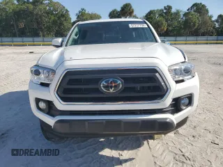 2023 Toyota Tacoma SR5 z VIN 3TMAZ5CN3PM212056, wystawiony jako Copart lot #57217735 z przebiegiem 36 533 mil mil oraz Szkoda całkowita • Salvage title. Historia ofert i sprzedaży dostępna na DreamBid. Obrazek 5.
