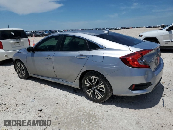 2017 Honda Civic EX-L with VIN 19XFC1F7XHE030606, listed as a Copart auction lot 56536095 with 101,465 mi miles and Salvage title. Bid and sale history available at DreamBid. Image 2.