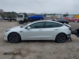 2023 Tesla Model 3 Long Range with VIN 5YJ3E1EB9PF393622, listed as a IAAI auction lot 41207132 with 14,097 mi miles and . Bid and sale history available at DreamBid. Image 14.