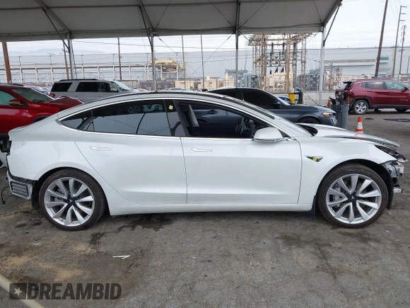 2020 Tesla Model 3 Long Range with VIN 5YJ3E1EB5LF801530, listed as a IAAI auction lot 41682050 with 65,743 mi miles. Bid and sale history available at carsss.com. Image 13.