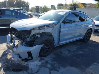 2023 BMW X4 M with VIN 5YM23EC0XP9P23425, listed as a IAAI auction lot 41147096 with 22,958 mi miles. Bid and sale history available at carsss.com. Image 2.