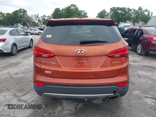 2015 Hyundai Santa Fe z VIN 5XYZT3LB7FG299504, wystawiony jako IAAI lot #42434744 z przebiegiem 104 570 mil mil oraz . Historia ofert i sprzedaży dostępna na DreamBid. Obrazek 16.