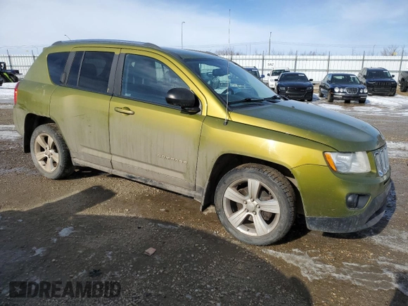 2012 Jeep Compass High Altitude with VIN 1C4NJDAB7CD554630, listed as a Copart auction lot 49915565 with 266,206 mi miles and Salvage Title. Bid and sale history available at carsss.com. Image 4.