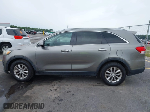 2016 Kia Sorento LX with VIN 5XYPGDA51GG012335, listed as a IAAI auction lot 42224249 with 166,752 mi miles and . Bid and sale history available at DreamBid. Image 14.