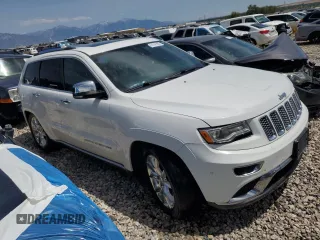 2015 Jeep Grand Cherokee Summit with VIN 1C4RJFJM5FC738473, listed as a Copart auction lot 61049565 with 176,053 mi miles and Clean title. Bid and sale history available at DreamBid. Image 4.
