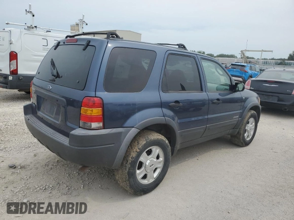 2001 Ford Escape XLT with VIN 1FMYU03131KF10968, listed as a Copart auction lot 67849474 with 197,328 mi miles and Salvage Title. Bid and sale history available at carsss.com. Image 3.