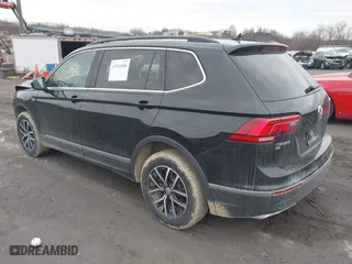2021 Volkswagen Tiguan SE with VIN 3VV2B7AX0MM049291, listed as a IAAI auction lot 41910106 with 68,468 mi miles. Bid and sale history available at carsss.com. Image 3.