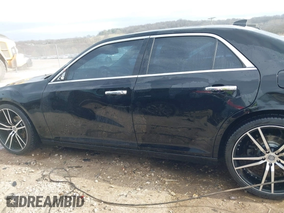 2015 Chrysler 300 C with VIN 2C3CCAEG8FH908477, listed as a IAAI auction lot 41702256 with 140,017 mi miles and . Bid and sale history available at carsss.com. Image 14.