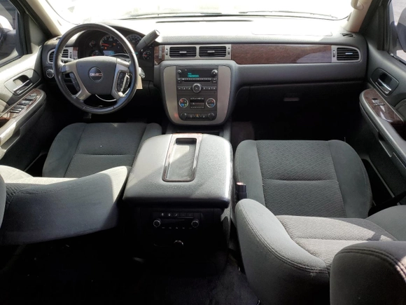 2008 GMC Yukon SLT w/4SB with VIN 1GKFC13J38J185621, listed as a Copart auction lot 71009934 with 173,476 mi miles and Salvage Title. Bid and sale history available at carsss.com. Image 8.