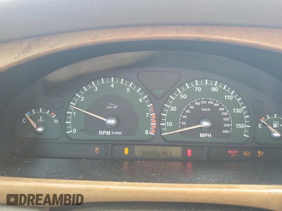 2003 Jaguar S-Type z VIN SAJEA01UX3HM59287, wystawiony jako Copart lot #85619554 z przebiegiem 182 851 mil mil oraz Tytuł czysty. Historia ofert i sprzedaży dostępna na DreamBid. Obrazek 9.
