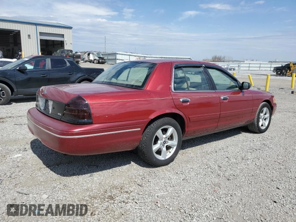 2003 Ford Crown Victoria LX z VIN 2FAFP74W43X100336, wystawiony jako Copart lot #51004035 z przebiegiem 82 089 mil mil oraz Szkoda całkowita • Salvage title. Historia ofert i sprzedaży dostępna na DreamBid. Obrazek 3.