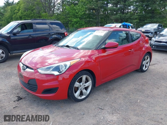 2012 Hyundai Veloster w/Gray Int z VIN KMHTC6AD7CU036446, wystawiony jako IAAI lot #42267057 z przebiegiem 110 564 mil mil oraz . Historia ofert i sprzedaży dostępna na DreamBid. Obrazek 2.