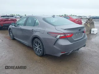 2023 Toyota Camry SE z VIN 4T1T11AK0PU084934, wystawiony jako IAAI lot #41962805 z przebiegiem 39 395 mil mil oraz . Historia ofert i sprzedaży dostępna na DreamBid. Obrazek 3.