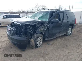 2011 GMC Yukon SLT with VIN 1GKS2CE02BR365229, listed as a IAAI auction lot 41601082 with 203,739 mi miles. Bid and sale history available at carsss.com. Image 17.