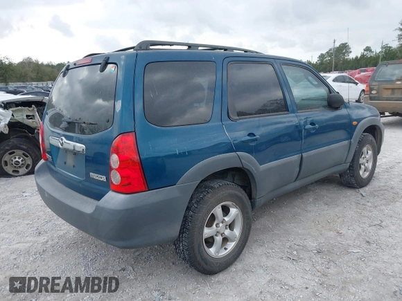 2005 Mazda Tribute i with VIN 4F2YZ02Z85KM19097, listed as a IAAI auction lot 41547466 with 121,709 mi miles and . Bid and sale history available at carsss.com. Image 4.