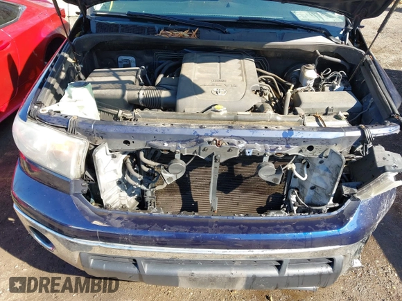 2013 Toyota Tundra z VIN 5TFUM5F14DX043076, wystawiony jako IAAI lot #41633905 z przebiegiem 157 850 mil mil oraz . Historia ofert i sprzedaży dostępna na DreamBid. Obrazek 10.