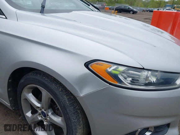 2013 Ford Fusion SE with VIN 3FA6P0HR5DR199082, listed as a IAAI auction lot 42191538 with 142,527 mi miles and . Bid and sale history available at DreamBid. Image 6.