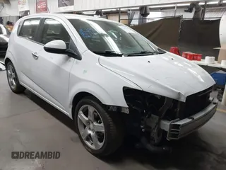 2016 Chevrolet Sonic LTZ z VIN 1G1JE6SB3G4146170, wystawiony jako IAAI lot #41567649 z przebiegiem 85 054 mil mil oraz . Historia ofert i sprzedaży dostępna na DreamBid. Obrazek 1.