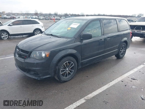 2015 Dodge Grand Caravan SE with VIN 2C4RDGBG8FR669355, listed as a IAAI auction lot 41486867 with 189,650 mi miles and . Bid and sale history available at DreamBid. Image 2.