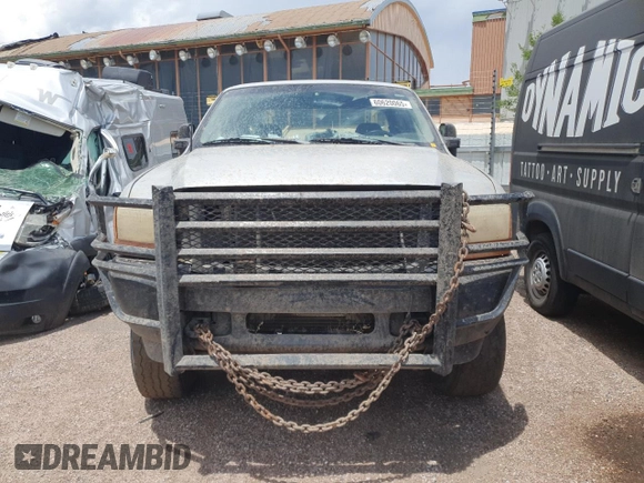 2001 Ford F-250 XL with VIN 1FTNX21L31EB70699, listed as a Copart auction lot 60620065 with 156,033 mi miles and Clean title. Bid and sale history available at DreamBid. Image 5.