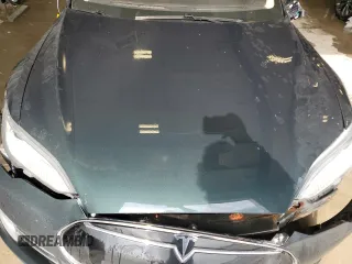 2013 Tesla Model S with VIN 5YJSA1DN1DFP12218, listed as a Copart auction lot 54717725 with Not Provided miles and Non Repairable. Bid and sale history available at carsss.com. Image 12.
