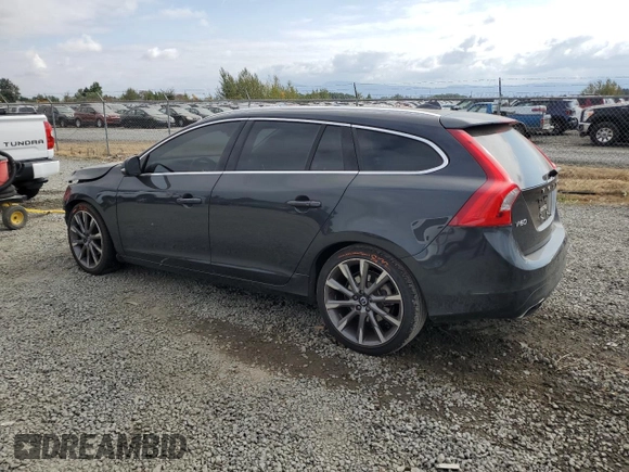 2015 Volvo V60 T5 Drive-E Premier with VIN YV140MEKXF1259241, listed as a Copart auction lot 66890004 with 117,600 mi miles and Salvage Title. Bid and sale history available at carsss.com. Image 2.