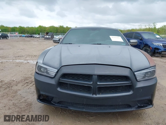 2012 Dodge Charger SE with VIN 2C3CDXBG8CH162631, listed as a IAAI auction lot 42192493 with 202,047 mi miles and . Bid and sale history available at DreamBid. Image 13.