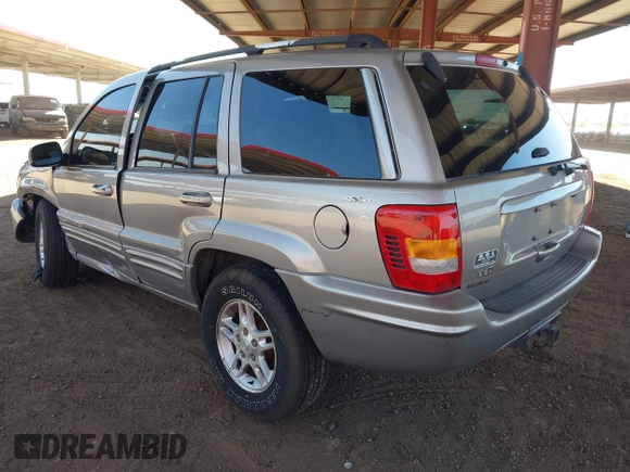 2000 Jeep Grand Cherokee Limited z VIN 1J4GW58N1YC206992, wystawiony jako IAAI lot #42057236 z przebiegiem 183 986 mil mil oraz . Historia ofert i sprzedaży dostępna na DreamBid. Obrazek 3.
