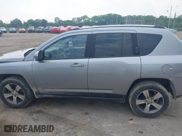 2016 Jeep Compass High Altitude with VIN 1C4NJDEBXGD730764, listed as a IAAI auction lot 42371491 with 125,302 mi miles and . Bid and sale history available at DreamBid. Image 14.