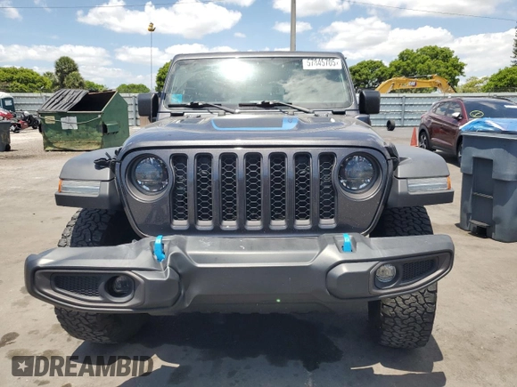 2023 Jeep Wrangler Rubicon z VIN 1C4JJXR65PW557849, wystawiony jako Copart lot #57845705 z przebiegiem 21 849 mil mil oraz Szkoda całkowita • Salvage title. Historia ofert i sprzedaży dostępna na DreamBid. Obrazek 5.