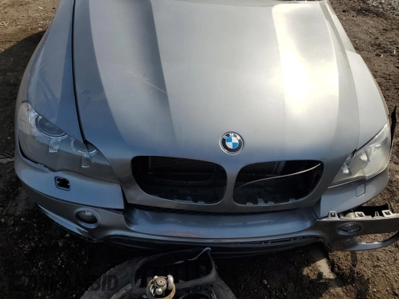2012 BMW X5 35i with VIN 5UXZV4C51CL764495, listed as a Copart auction lot 48718915 with Not provided miles and Salvage title. Bid and sale history available at DreamBid. Image 12.