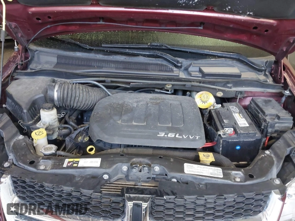 2018 Dodge Grand Caravan SXT with VIN 2C4RDGCG4JR297603, listed as a IAAI auction lot 42144645 with 114,098 mi miles and . Bid and sale history available at DreamBid. Image 10.