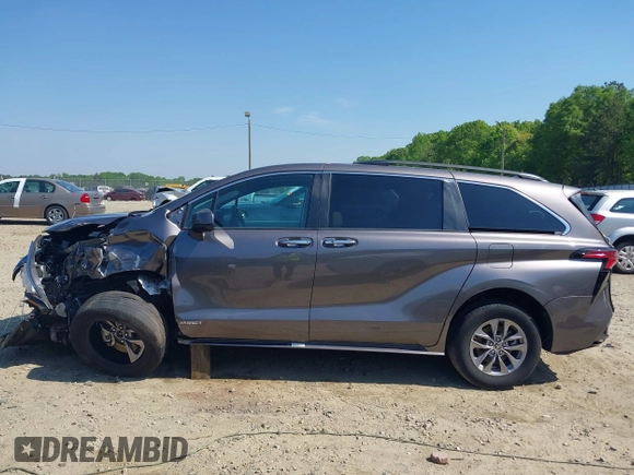 2021 Toyota Sienna XLE z VIN 5TDYRKEC0MS007394, wystawiony jako IAAI lot #42080004 z przebiegiem 75 553 mil mil oraz . Historia ofert i sprzedaży dostępna na DreamBid. Obrazek 15.