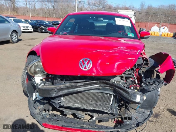 2012 Volkswagen Beetle 2.5L PZEV with VIN 3VWJP7AT5CM631505, listed as a IAAI auction lot 41733955 with 35,519 mi miles. Bid and sale history available at carsss.com. Image 18.