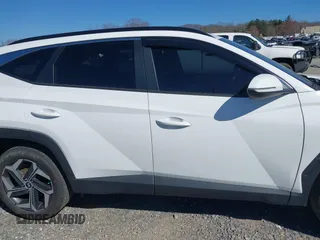 2023 Hyundai Tucson SEL with VIN 5NMJFCAE3PH261633, listed as a IAAI auction lot 41795265 with 39,374 mi miles and . Bid and sale history available at DreamBid. Image 13.