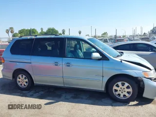 2003 Honda Odyssey EX-L with VIN 5FNRL18973B148675, listed as a IAAI auction lot 41992952 with 232,013 mi miles and . Bid and sale history available at DreamBid. Image 13.
