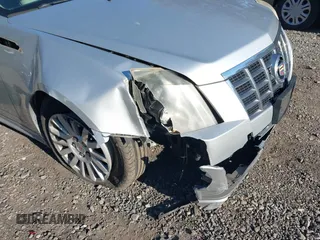 2012 Cadillac CTS Sedan Luxury with VIN 1G6DG5E50C0116725, listed as a IAAI auction lot 41694928 with 114,214 mi miles. Bid and sale history available at carsss.com. Image 6.