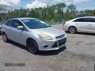 2013 Ford Focus SE z VIN 1FADP3F24DL104525, wystawiony jako IAAI lot #42339989 z przebiegiem 128 241 mil mil oraz . Historia ofert i sprzedaży dostępna na DreamBid. Obrazek 1.